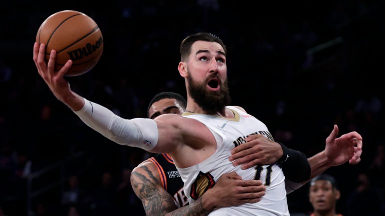 New Orleans Pelicans center Jonas Valanciunas is fouled by New York Knicks forward Obi Toppin during the second half of an NBA basketball game Thursday, Jan. 20, 2022, in New York. The Pelicans won 102-91. (Adam Hunger/AP) 
