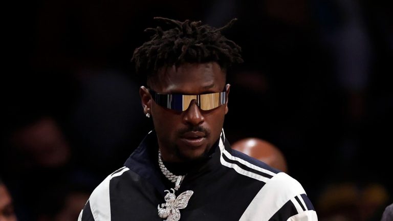 Former Tampa Bay Buccaneers wide receiver Antonio Brown arrives courtside during the second half of an NBA basketball game between the Memphis Grizzlies and the Brooklyn Nets, Monday, Jan. 3, 2022, in New York. (Adam Hunger/AP)