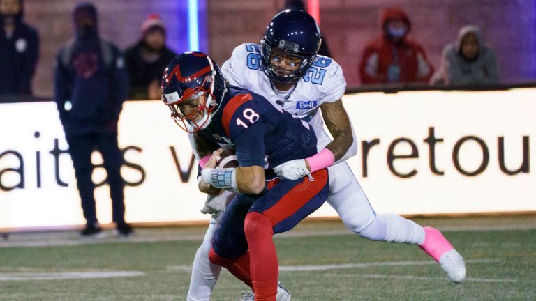 Montreal Alouettes quarterback Matthew Shiltz is sacked by Toronto Argonauts linebacker Dexter McCoil during first quarter CFL football action. (Paul Chiasson/CP)