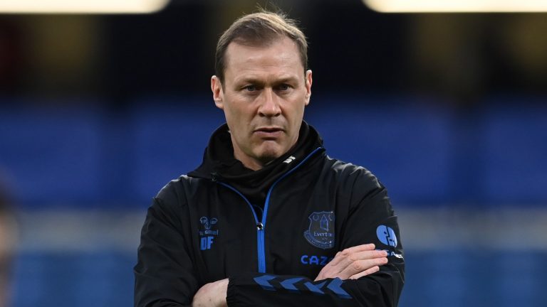 Everton assistant manager Duncan Ferguson looks on before their English Premier League soccer match against Chelsea at the Stamford Bridge stadium in London, March 8, 2021. Everton has on Tuesday, Jan. 18, 2022 promoted Ferguson to caretaker manager while it searches for Rafa Benitez’s successor. (Glyn Kirk/Pool via AP) 