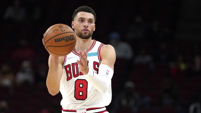 Chicago Bulls' Zach LaVine passes during the second half of an NBA preseason basketball game against the Cleveland Cavaliers. (Charles Rex Arbogast/AP)