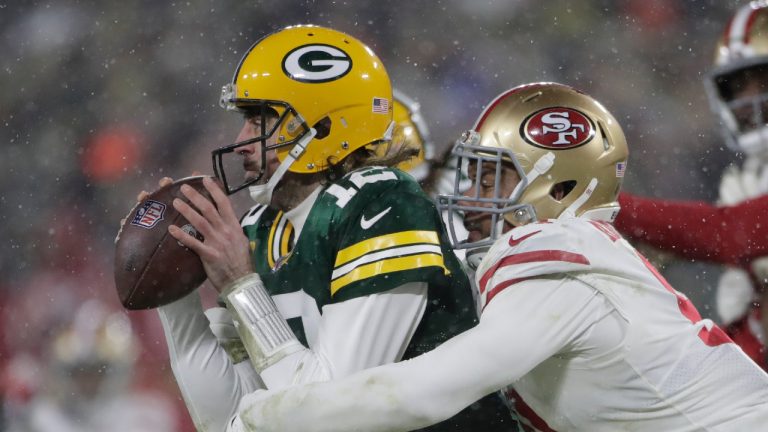 San Francisco 49ers' Arik Armstead sacks Green Bay Packers' Aaron Rodgers during the second half of an NFC divisional playoff NFL football game Saturday, Jan. 22, 2022, in Green Bay, Wis. (Aaron Gash/AP) 
