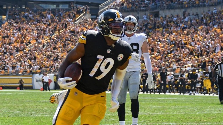 Pittsburgh Steelers wide receiver JuJu Smith-Schuster (19) scores during the first half of an NFL football game against the Las Vegas Raiders in Pittsburgh, Sunday, Sept. 19, 2021. (Don Wright/AP)