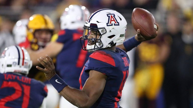 Arizona's Khalil Tate (14) looks to pass against Arizona State's defence during the first half of an NCAA college football game, Saturday, Nov. 30, 2019, in Tempe, Ariz. (Darryl Webb/AP Photo) 
