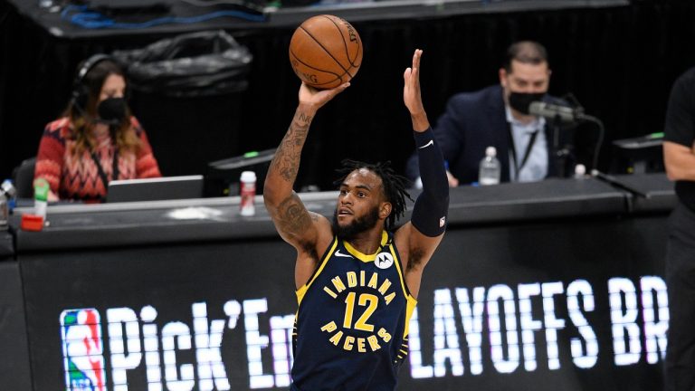 Indiana Pacers forward Oshae Brissett (12) shoots during the second half of the team's NBA basketball Eastern Conference play-in game against the Washington Wizards, Thursday, May 20, 2021, in Washington. (Nick Wass/AP Photo)