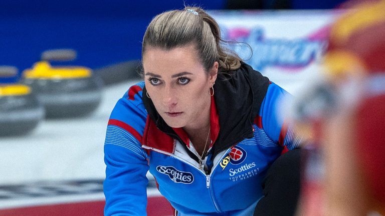 Wild Card 3 skip delivers a rock as they play Nunavut at the Scotties Tournament of Hearts at Fort William Gardens in Thunder Bay, Ont. on Tuesday, Feb.1, 2022. THE CANADIAN PRESS/Andrew Vaughan