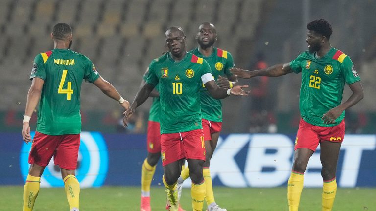 Cameroon's Vincent Aboubakar, center, celebrates with teammates after scoring his team's third goal during the African Cup of Nations 2022, third place soccer match between Burkina Faso and Cameroon at the Ahmadou Ahidjo stadium in Yaounde, Cameroon, Saturday, Feb. 5, 2022. (Themba Hadebe/AP)