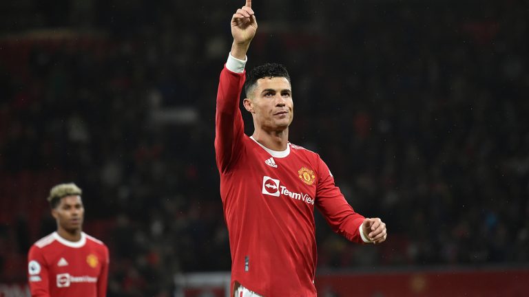 Manchester United's Cristiano Ronaldo acknowledges fans after the English Premier League soccer match between Manchester United and Brighton & Hove Albion at Old Trafford stadium, in Manchester, England, Tuesday, Feb. 15, 2022. (Rui Vieira/AP)
