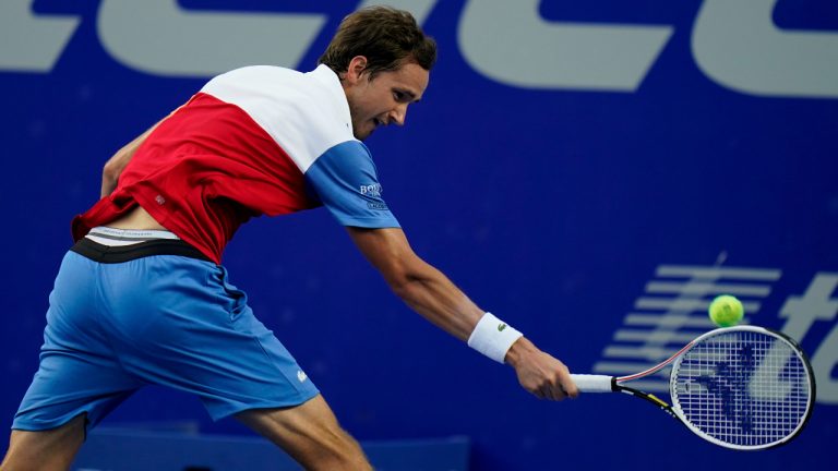 Daniil Medvedev of Russia returns a ball during a match againstÂ to Pablo Andujar of Spain at the Mexican Open tennis tournament in Acapulco, Mexico, Wednesday, Feb. 23, 2022. (AP Photo/Eduardo Verdugo)