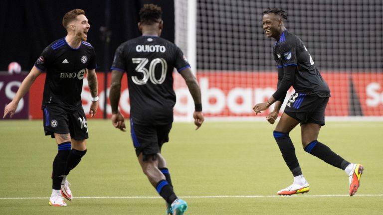CF Montreal's Ismael Kone, right, celebrates with teammates after scoring against Santos Laguna during the second half of the second leg of their 2022 CONCACAF Champions League soccer game in Montreal, Wednesday, February 23, 2022. THE CANADIAN PRESS/Graham Hughes