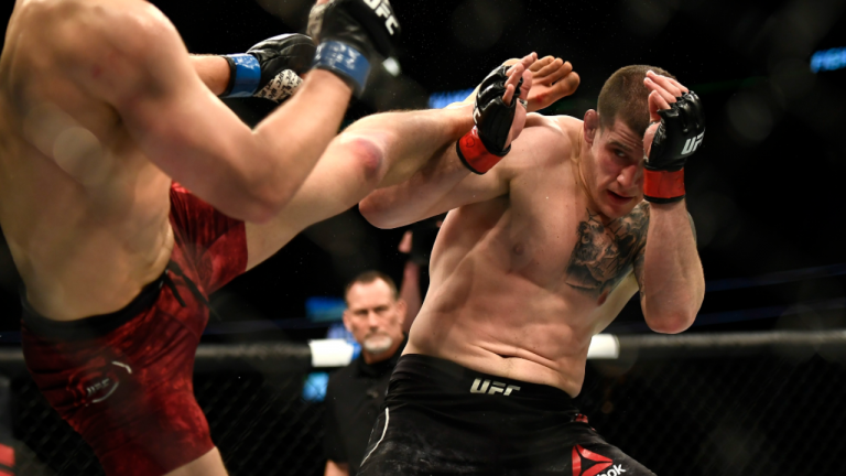 Andrew Sanchez, left, and Marc-Andre Barriault fight in the middleweight bout during UFC Fight Night in Ottawa on Saturday, May 4, 2019. (CP/file)