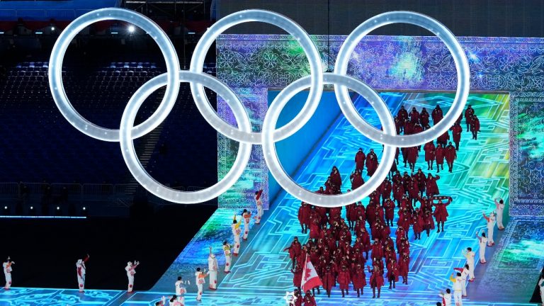 Canadian athletes enetr the stadium during the opening ceremony at the Beijing Winter Olympics in Beijing, China, on Friday, Feb. 4, 2022. (Paul Chiasson/THE CANADIAN PRESS)