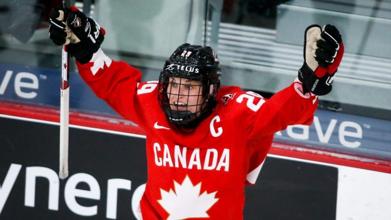 Canada's Marie-Philip Poulin celebrates her gold medal winning goal during overtime IIHF Women's World Championship hockey action against the United States in Calgary, Tuesday, Aug. 31, 2021. (Jeff McIntosh/CP)