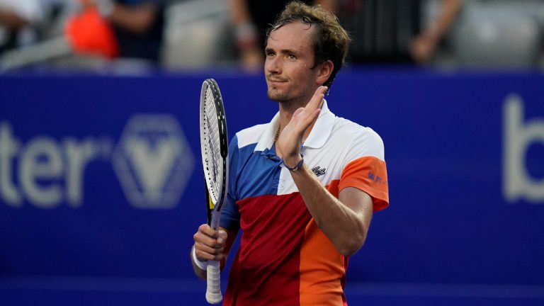 Daniil Medvedev of Russia greets cheering fans after defeating Yoshihito Nishioka of Japan in the quarterfinal match of the Mexican Open tennis tournament in Acapulco, Mexico, Thursday, Feb. 24, 2022. (Eduardo Verdugo/AP)