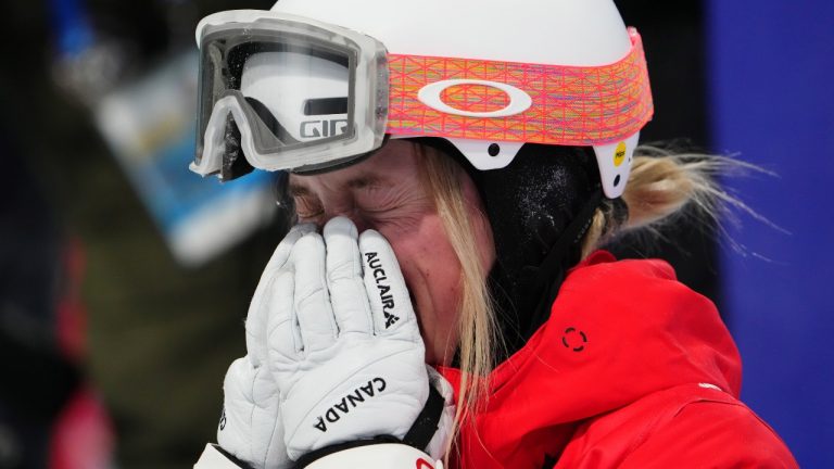 Justine Dufour-Lapointe, of Canada, reacts after her run during women's moguls finals at the Beijing Winter Olympics in Zhangjiakou, China, on Sunday, Feb. 6, 2022. (Sean Kilpatrick/THE CANADIAN PRESS)