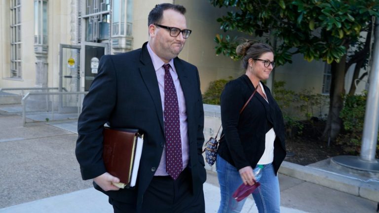 Former Los Angeles Angels employee Eric Kay, left, walks out of a federal court building where he is on trial for federal drug distribution and conspiracy charges, in Fort Worth, Texas, Tuesday, Feb. 15, 2022. Kay is accused of providing Tyler Skaggs the drugs that led to the pitcher's overdose death. The 27-year-old Skaggs was found dead in July 2019 in a suburban Dallas hotel room. He had choked to death on his vomit, and a toxic mix of alcohol, fentanyl and oxycodone was in his system. (LM Otero/AP)