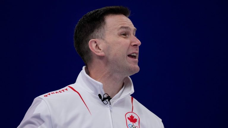 Canada's Brad Gushue, directs his teammates, during the men's curling match against the Denmark, at the 2022 Winter Olympics, Wednesday, Feb. 9, 2022, in Beijing. (Nariman El-Mofty/AP Photo)
