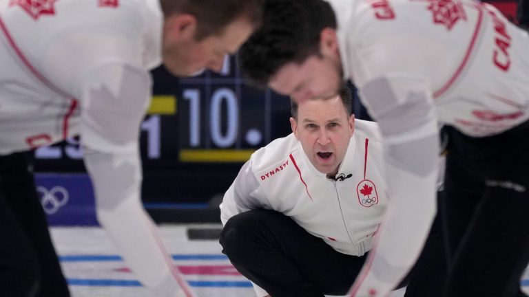 Canadian skip Brad Gushue directs his teammates during a game against the Russians on Tuesday at the Beijing Olympics. (AP Photo)