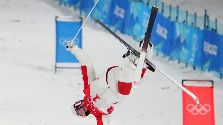 Mikael Kingsbury, of Canada, competes in the heats during the men's moguls at the 2022 Winter Olympics in Zhangjiakou, China on Saturday, February 5, 2022. (Sean Kilpatrick/THE CANADIAN PRESS)