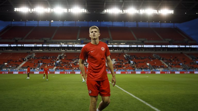 Canada midfielder Liam Fraser leaves the soccer field prior to the start CONCACAF Nations League play against Cuba at BMO Field in Toronto, Saturday, Sept. 7, 2019. (Cole Burston/CP)