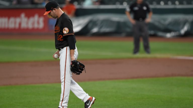 Baltimore Orioles starting pitcher Matt Harvey steps off the mound after having given up three runs to the Tampa Bay Rays during the first inning of baseball game Friday, Aug. 27, 2021, in Baltimore. (Gail Burton/AP)