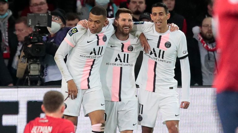 PSG's Lionel Messi, third from left, celebrates with his teammates after scoring his side's third goal during the French League One soccer match between Lille and Paris Saint Germain at Pierre Mauroy stadium in Villeneuve d'Ascq in Lille, France, Sunday, Feb. 6, 2022. (Michel Spingler/AP)