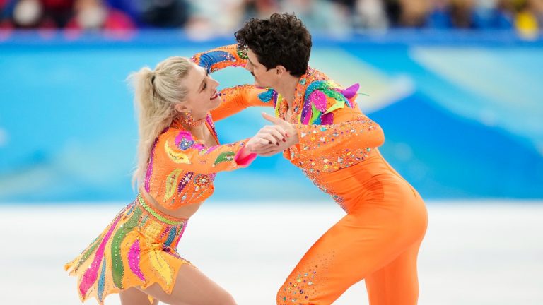 Canada's Piper Gilles and Paul Poirier compete during the ice dance portion of the figure skating team event at the 2022 Winter Olympics in Beijing on Friday, February 4, 2022. (Paul Chiasson/THE CANADIAN PRESS)