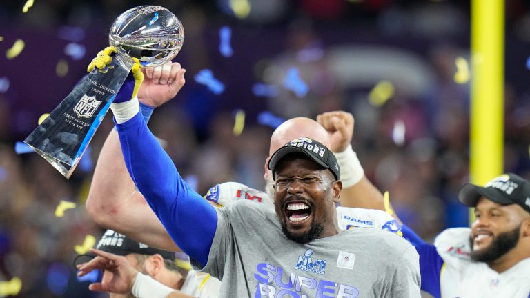 Los Angeles Rams outside linebacker Von Miller holds up the Lombardi Trophy after the Rams defeated the Cincinnati Bengals in the NFL Super Bowl 56 football game Sunday, Feb. 13, 2022, in Inglewood, Calif. (Chris O'Meara/AP)