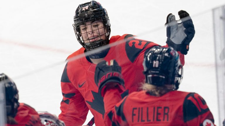 Team Canada forward Sarah Nurse (20) celebrates with teammates after scoring against Finland during second period women's ice hockey action Saturday, February 5, 2022 at the Winter Olympics in Beijing. (Ryan Remiorz/THE CANADIAN PRESS)