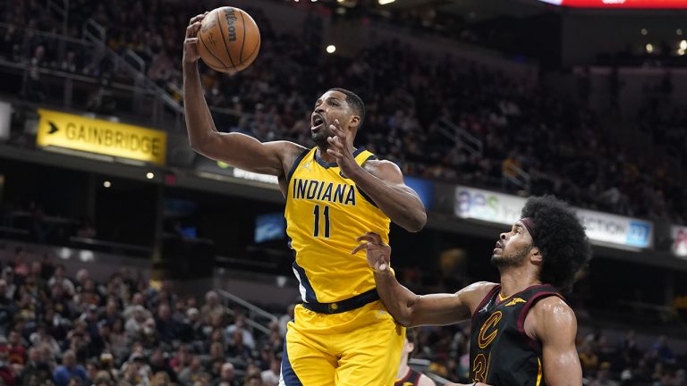 Indiana Pacers' Tristan Thompson (11) grabs a rebound next to Cleveland Cavaliers' Jarrett Allen (31) during the second half of an NBA basketball game. (Darron Cummings/AP)