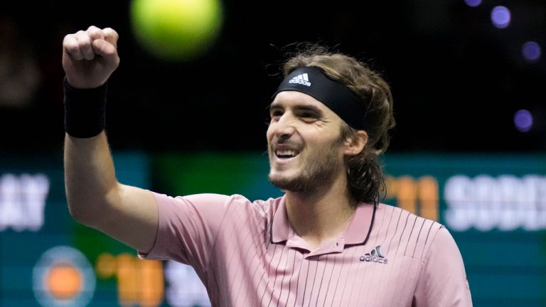 Stefanos Tsitsipas of Greece celebrates winning against Jiri Lehecka of the Czech Republic in three sets, 4-6, 6-4, 6-3, in their semifinal men's singles match of the ABN AMRO world tennis tournament. (Peter Dejong/AP)