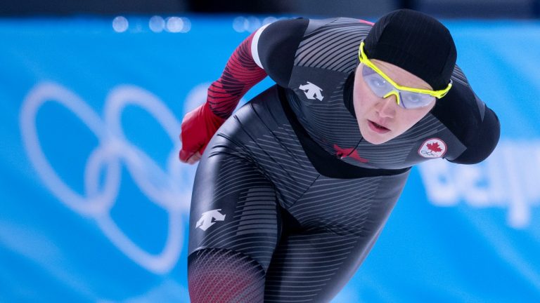 Canada’s Isabelle Weidemann, of Canada, rounds the oval to win the bronze medal in the women’s 3,000 metre speedskating race at the 2022 Winter Olympics in Beijing on Saturday, February 5, 2022. (Paul Chiasson/THE CANADIAN PRESS)