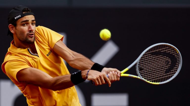 Matteo Berrettini of Italy returns the ball to Thiago Monteiro of Brazil, during a Rio Open Tennis tournament match in Rio de Janeiro, Brazil, Friday, Feb. 18, 2022. (Bruna Prado/AP)