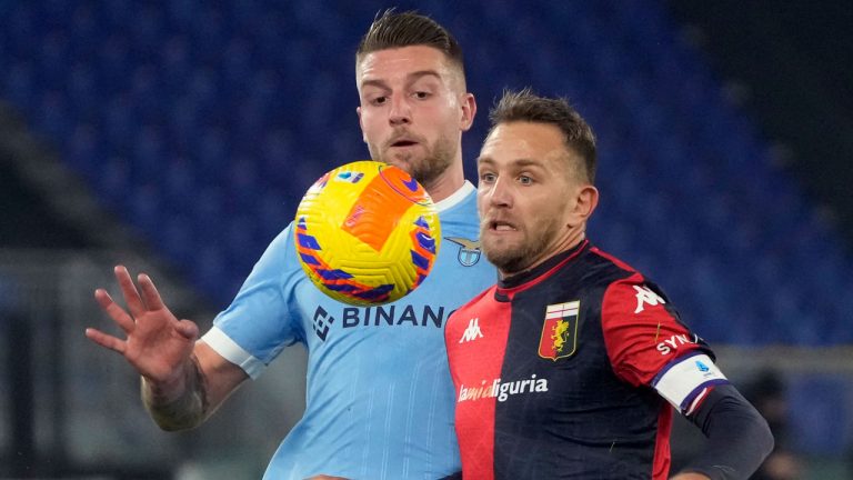 Genoa's Domenico Criscito, right, and Lazio's Sergej Milinkovic-Savic, left, vie for the ball during the Italian Series A soccer match between Lazio and Genoa. (Gregorio Borgia/AP)