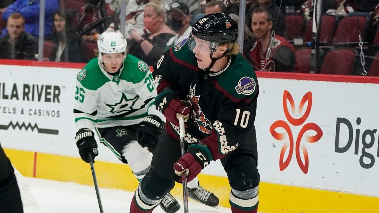 Arizona Coyotes' Ryan Dzingel (10) skates away from Dallas Stars' Joel Kiviranta (25) during the first period of an NHL hockey game. (Darryl Webb/AP)