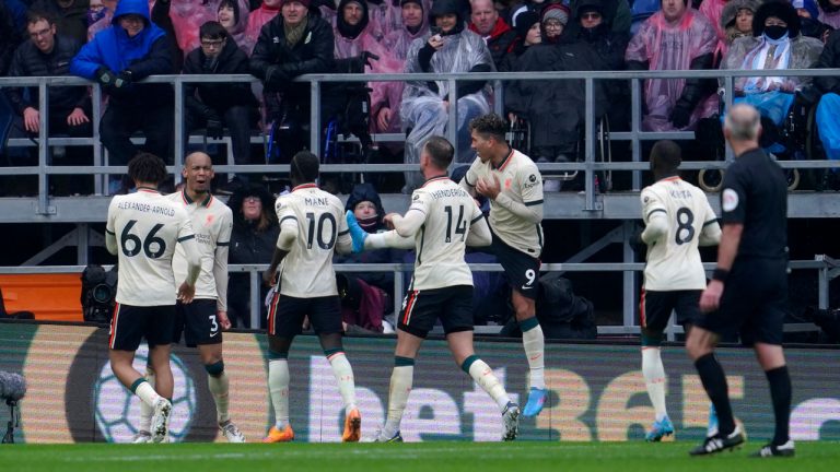 Liverpool's Fabinho, second left, celebrates after scoring his side's opening goal during the English Premier League soccer match between Burnley and Liverpool. (Jon Super/AP)