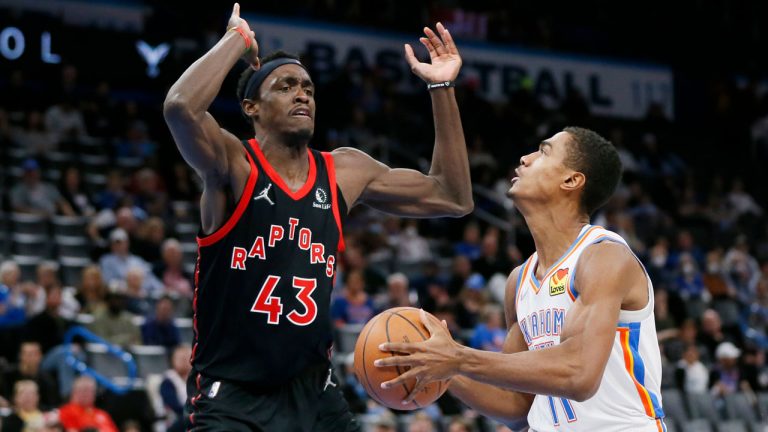 Oklahoma City Thunder guard Theo Maledon, right, looks to score against Toronto Raptors forward Pascal Siakam (43) in the second half of an NBA basketball game. (Nate Billings/AP)