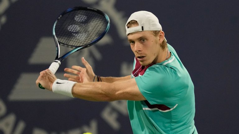 Canada's Denis Shapovalov returns the ball to Czech Republic's Jiri Vesely during a semifinal match of the Dubai Duty Free Tennis Championship in Dubai. (Kamran Jebreili/AP)