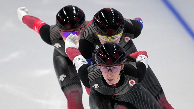 Team Canada, led by Ivanie Blondin, with Isabelle Weidemann centre and Valerie Maltais, competes in the speedskating women's team pursuit quarterfinals at the 2022 Winter Olympics, Saturday, Feb. 12, 2022, in Beijing. (Sue Ogrocki/AP Photo)