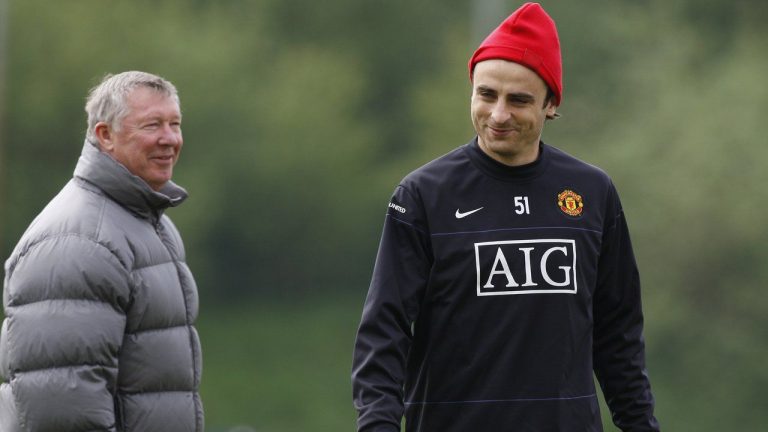 Manchester United's manager Alex Ferguson, left, is seen with striker Dimitar Berbatov as the team train at Carrington training ground the day before their Champions League semi-final soccer match against Arsenal in Manchester, England, Tuesday April 28, 2009. Dimitar Berbatov’s curiosity about leadership was sparked by seeing the books in his the office of Manchester United manager Alex Ferguson. A biography of Napoleon Bonaparte made an impression on one of Bulgaria’s greatest forwards. Berbatov is now leading a campaign to become president of his national soccer federation. (Jon Super/AP)