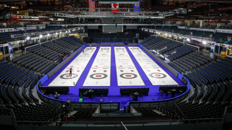 Ice technicians prepare the ice at the Tim Hortons Brier curling tournament in Lethbridge, Alta., Thursday, March 3, 2022. (Jeff McIntosh/CP)