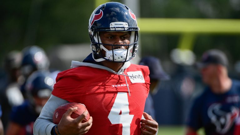 Texans quarterback Deshaun Watson runs drills with the team during practice. (Justin Rex/AP)
