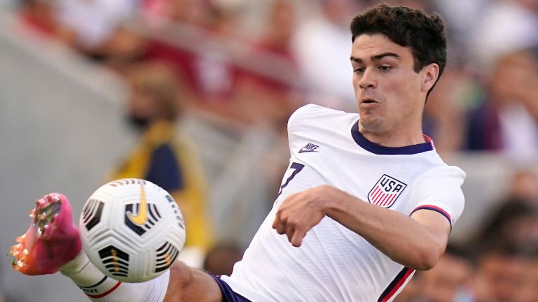 United States Gio Reyna controls the ball against Costa Rica in the second half during an international friendly soccer match. (Rick Bowmer/AP)