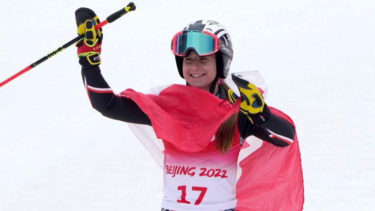 Mollie Jepsen of Canada celebrates after competing in the women's giant slalom, at the 2022 Winter Paralympics. (Andy Wong/AP)