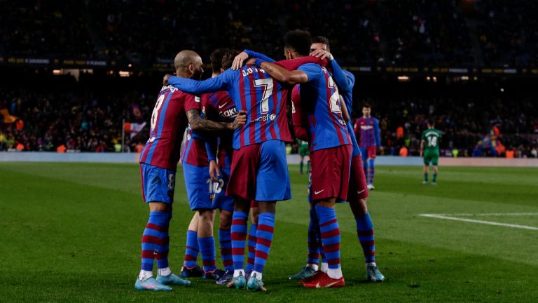 Barcelona's Pierre-Emerick Aubameyang celebrates after scoring with his teammates during a Spanish La Liga soccer match between FC Barcelona and Osasuna. (Joan Monfort/AP)