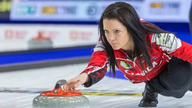 Canada skip Kerri Einarson throws a stone at CN Centre. (James Doyle/CP)