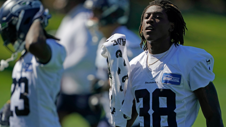 Seattle Seahawks cornerback Debione Renfro (38) wipes his face with a towel during NFL football training camp, Thursday, Sept. 3, 2020, in Renton, Wash. (AP/file)