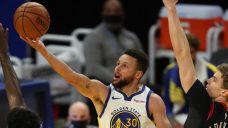 Warriors’ Curry to miss at least two weeks with hurt foot