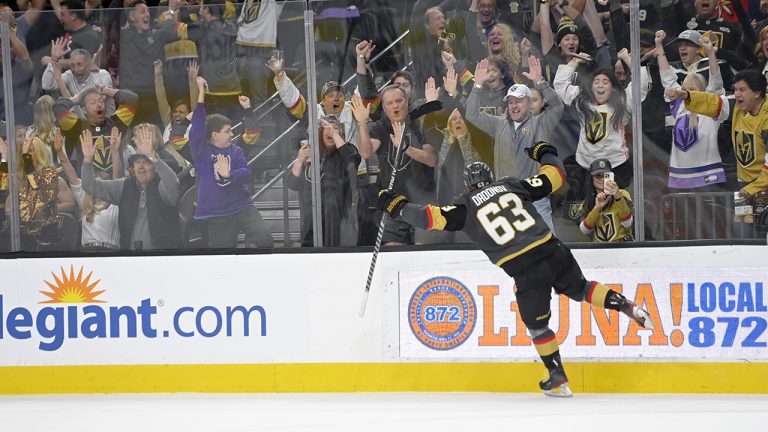 Vegas Golden Knights right wing Evgenii Dadonov (63) reacts after scoring the winning goal against the Chicago Blackhawks in overtime of an NHL hockey game. (David Becker/AP)