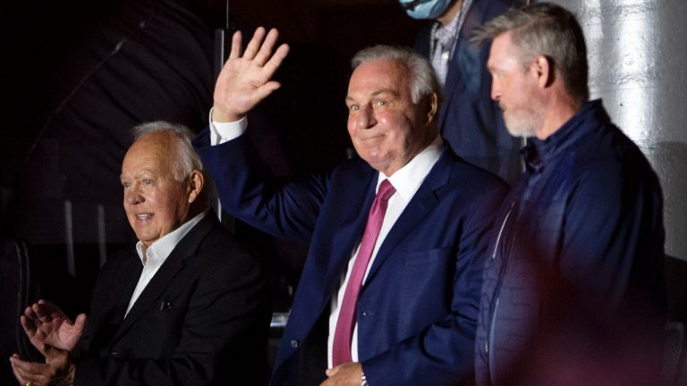 Montreal Canadiens legends Yvan Cournoyer, left, Guy Lafleur, centre, and Patrick Roy, right, salute the crowd prior to first period Game 4 Stanley Cup finals action between the Montreal Canadiens and the Tampa Bay Lightning, in Montreal, Monday, July 5, 2021. (Ryan Remiorz/AP)
